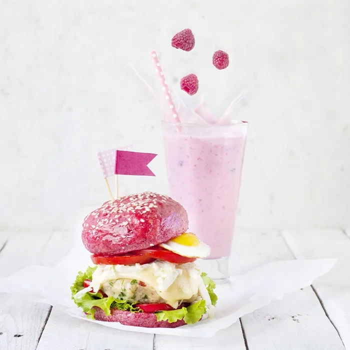 pink milkshake and burger bun